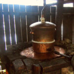 tuica romania - the copper still for distilling tuica or palinca in maramures romania